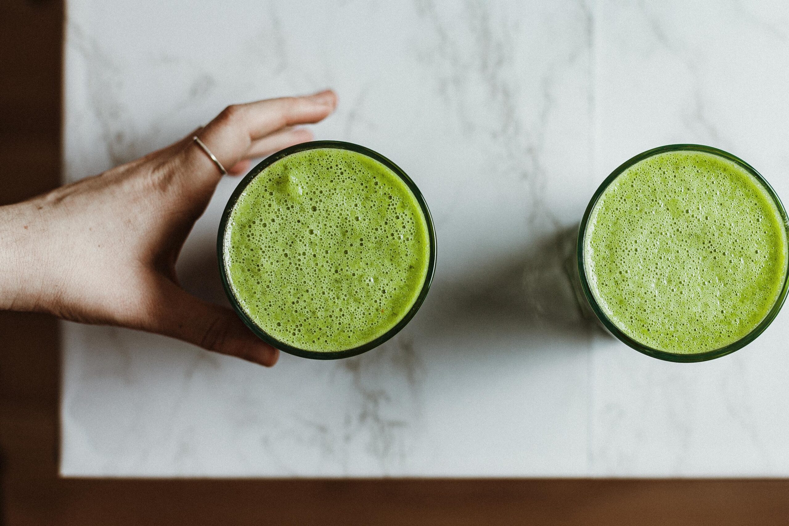 two healthy green drinks, of the kind a health coach would prescribe, healthy, health coaching
